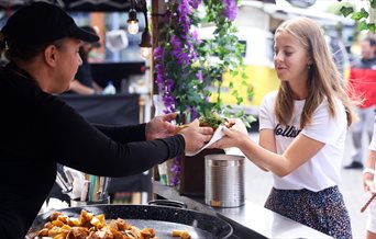 A girl ordering food at a Gunwharf Quays Street Food event