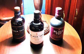 Photograph of three Black Tot rums