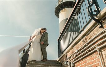 A couple celebrates at Southsea Castle