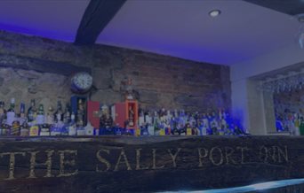 The well-stocked bar at the Sally Port Inn