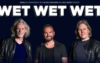 Poster featuring Wet Wet Wet's three band members.