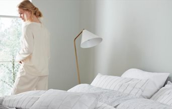 Murmur press shot showing white bedding