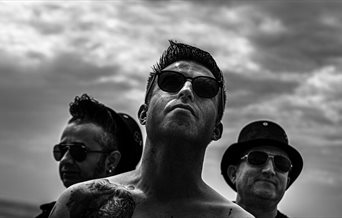 Black and white photograph of Depeche Mode tribute band The Devout