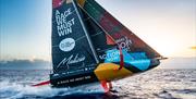 A race boat on its foils, copyright Antoine Auriol - Team Malizia - The Ocean Race