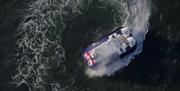 A Hovertravel craft performing a doughnut in the Solent