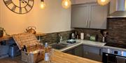The ample kitchen at The Beach at the End of the Road - The garden apartment