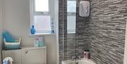 A fully equipped bathroom in The Beach at the End of the Road - The Roof Terrace