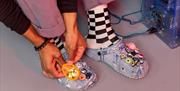 Personalised Crocs shoes with a denim-style design