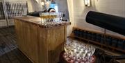 A drinks reception awaits guests on board HMS Warrior