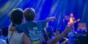 A family enjoying the live music at Victorious Festival