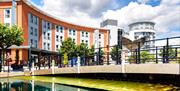 View of Holiday Inn Express from the water at Gunwharf Quays