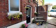 The entry to The Beach at the End of the Road - The garden apartment