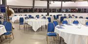 Conference tables set up at The John Fieldhouse Building