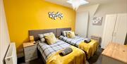 A twin room at The Beach at the End of the Road - The Roof Terrace
