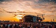 Sunset at the Victorious Festival main stage as Ocean Colour Scene perform