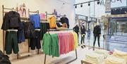 A rail of multi-coloured outfits at Sweaty Betty in Portsmouth