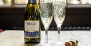 Enjoy a glass of fizz at Cosy Club Gunwharf