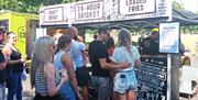 People at the Need Street Food stall at Southsea Food Festival
