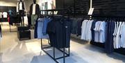 Clothing on the rails at Castore Gunwharf Quays