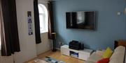 TV and games consoles at Beachside Townhouse