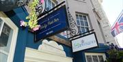 An external shot of the Sally Port Inn and Sally Antiques building