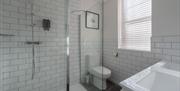A fully equipped shower room inside Florence Suite Boutique Hotel and Restaurant