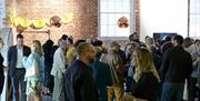 People gathered for networking at Aspex Gallery