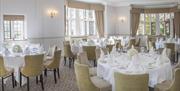 Banquet-style seating in the Dining Room at New Place Hotel