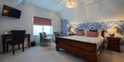 A spacious double bedroom at Florence House Boutique Hotel and Restaurant