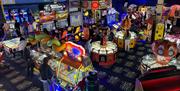 Arcade games indoors at Clarence Pier Amusement Park