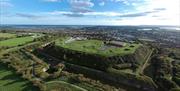 Aerial photograph of the fort, looking out from Portsdown Hill to Portsmouth and beyond