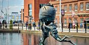 The sculpture on the canal at Gunwharf Quays