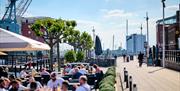 People dining al fresco at Gunwharf Quays
