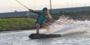 A woman using the high speed cable wake line