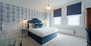 Blue and white tones in a double room at Florence Gardens Boutique Hotel and Restaurant