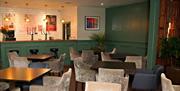 Nineteen at Skylarks Country Club, with seating and tables