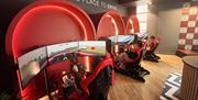 Visitors enjoying the Full Send Racing Lounge experience at Gunwharf Quays