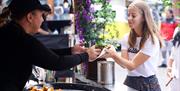 A girl ordering food at a Gunwharf Quays Street Food event