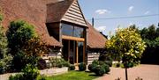 The exterior of The Barn at Skylarks Country Club