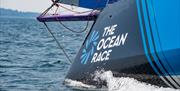 A boat taking part in The Ocean Race, emblazoned with the race livery, copyright Ainhoa Sanchez - The Ocean Race