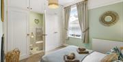 An en-suite bedroom in Tide Cottage