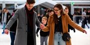 Young couple trying out Ice Skate Portsmouth