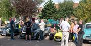 Group of car aficionados at a Port Solent Car Meet