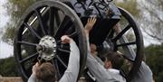 Lifting heavy machinery during a Field Gun Team Experience Day