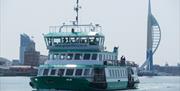 Gosport Ferry leaving Portsmouth Harbour with the Emirates Spinnaker Tower in the background