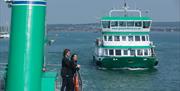 Passengers admiring the view of the Gosport Ferry.