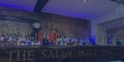 The well-stocked bar at the Sally Port Inn