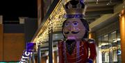 A nutcracker statue outside the shops at Gunwharf Quays