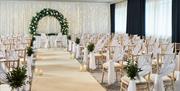 A room at Portsmouth Marriott dressed for a wedding ceremony