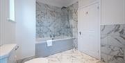 A modern and well-equipped bathroom at Somerset House Boutique Hotel and Restaurant